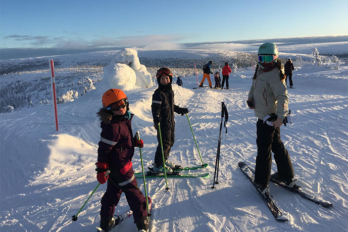 Exchange student skiing in Trysil with host family